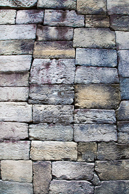 无人,竖图,室外,白天,正面,石头,一堆,一排,许多,阴影,堆叠,堆积,整齐,光线,石子,影子,墙,墙壁,墙面,排列,阳光,堆,风化,毛糙,队列,石块,岩石,彩图,粗拙